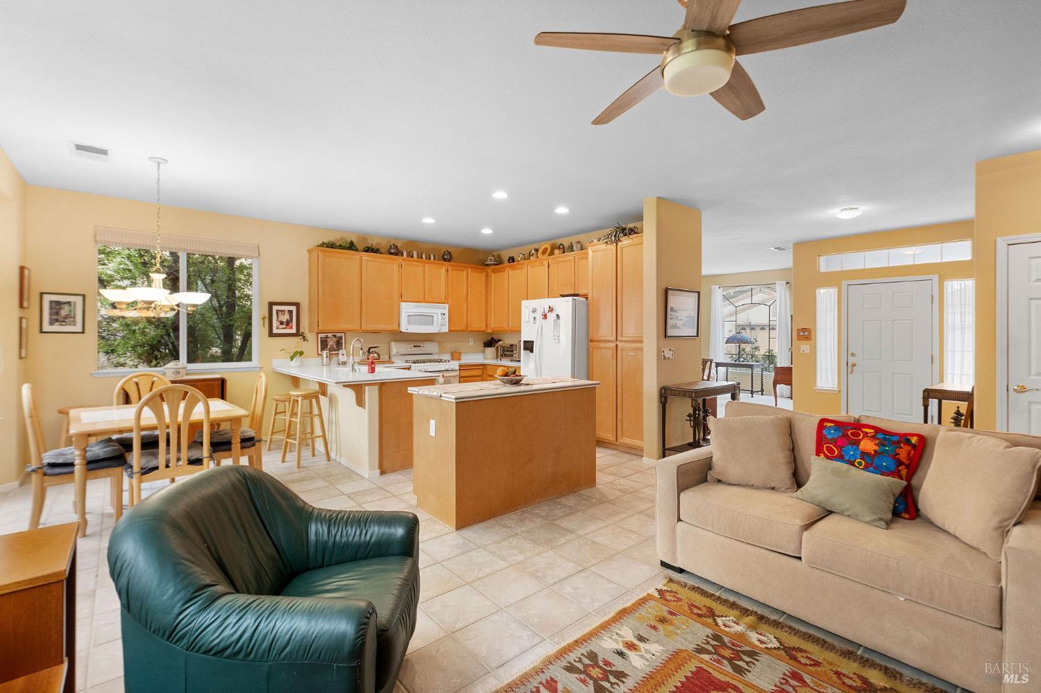 672 Meadowbrook Lane Rio Vista, CA 94571 - Photo 10 of 39 a living room with furniture kitchen view and a large window