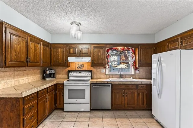 $359,000 | 7407 North Granby Avenue, Kansas City, MO 64151