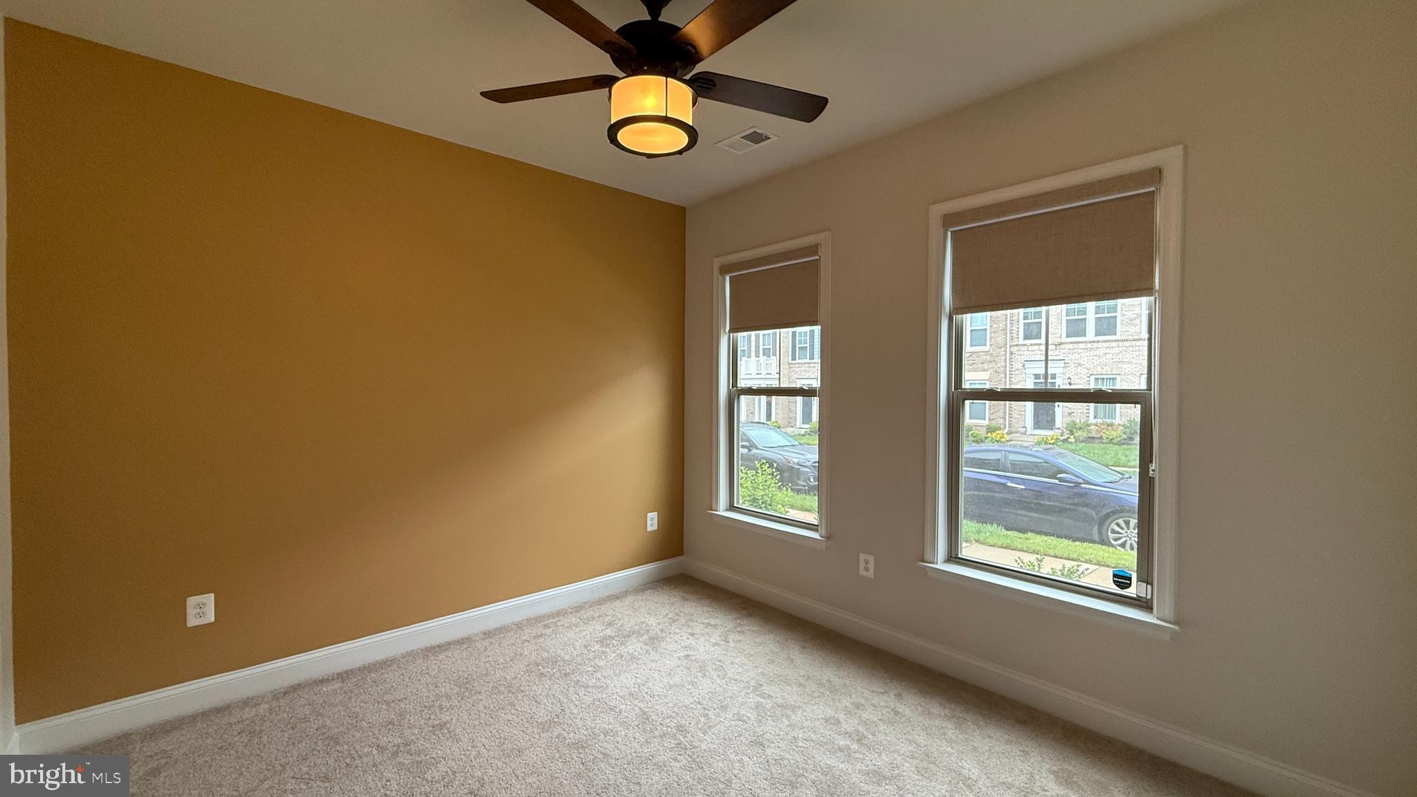 1949 Greenbriar Hall Road Dumfries, VA 22026 - Photo 21 of 26 an empty room with windows and fan