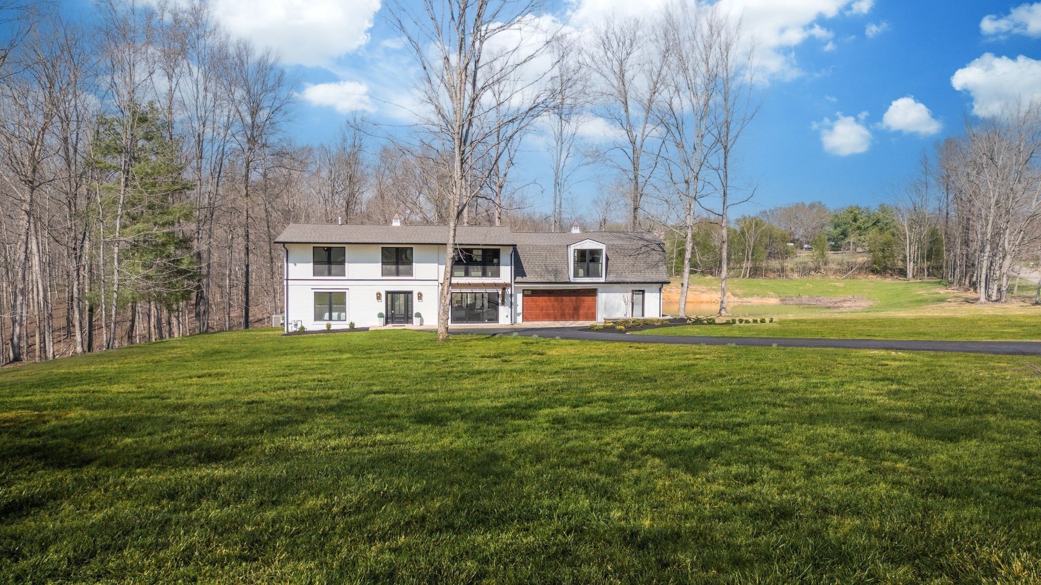 1510 East Piney Road Dickson, TN 37055 - Photo 2 of 66 a view of a house with a yard