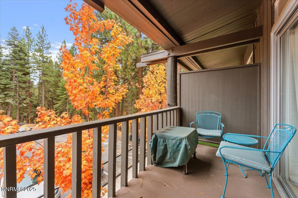 751 Tahoe Boulevard, Unit 21 Incline Village, NV 89451 - Photo 14 of 23 a view of a chair and table in the balcony