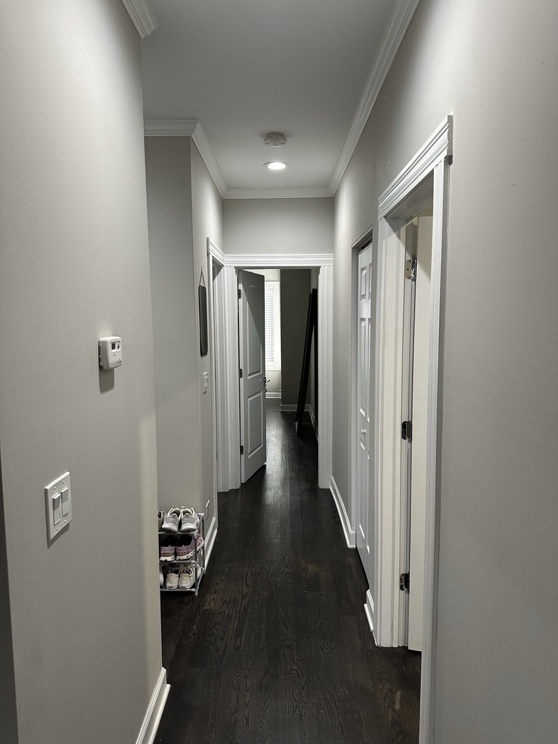 2138 West Shakespeare Avenue, Unit 1 Chicago, IL 60647 - Photo 3 of 14 a view of hallway with wooden floor