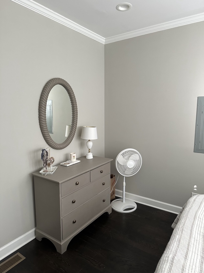 2138 West Shakespeare Avenue, Unit 1 Chicago, IL 60647 - Photo 8 of 14 a bathroom with a sink mirror and a lamp