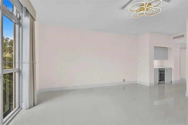 an empty room with a natural light