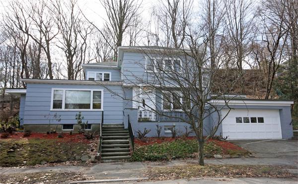 247 Crafts Road Brookline, MA 02467 - Photo 1 of 1 a front view of a house with a yard