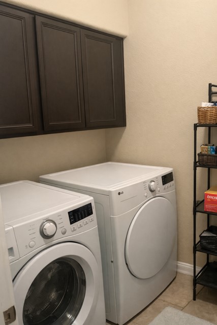 11613 Reading Court Austin, TX 78717 - Photo 13 of 16 a utility room with dryer and washer