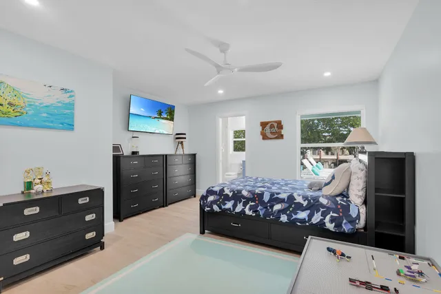 a bathroom with a sink vanity and a mirror