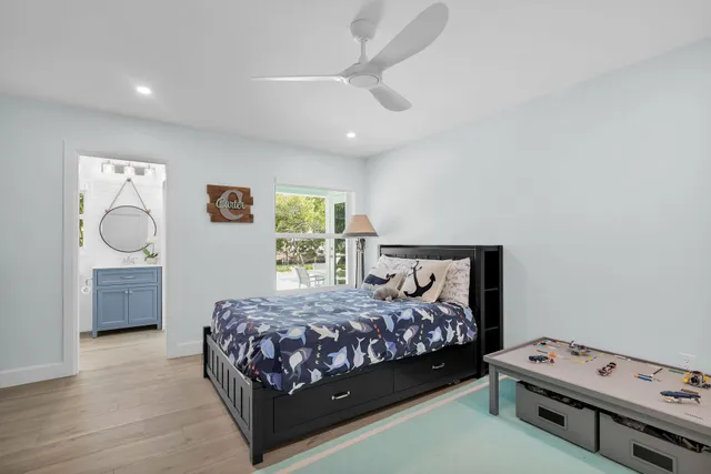 a bedroom with a bed and a couch