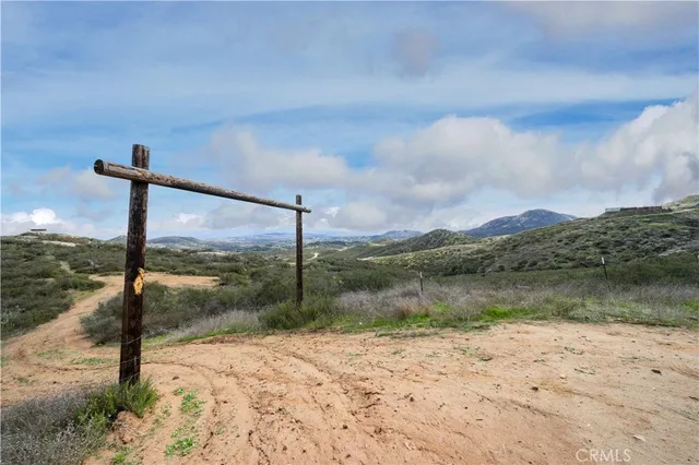 a view of a road with an ocean