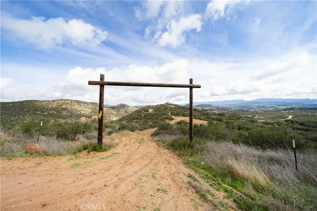 a view of a mountain from a yard