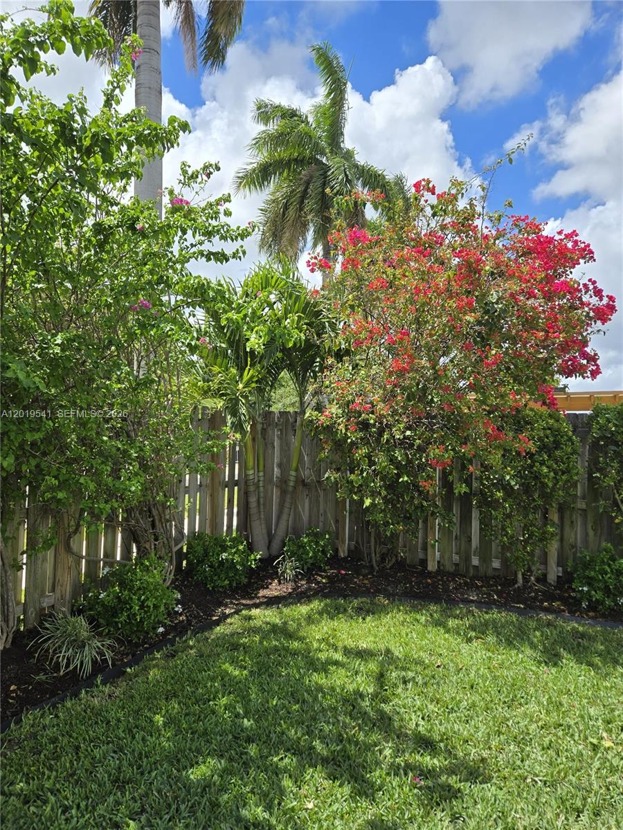 24400 Southwest 119th Place Homestead, FL 33032 - Photo 9 of 22 a picture of flowers