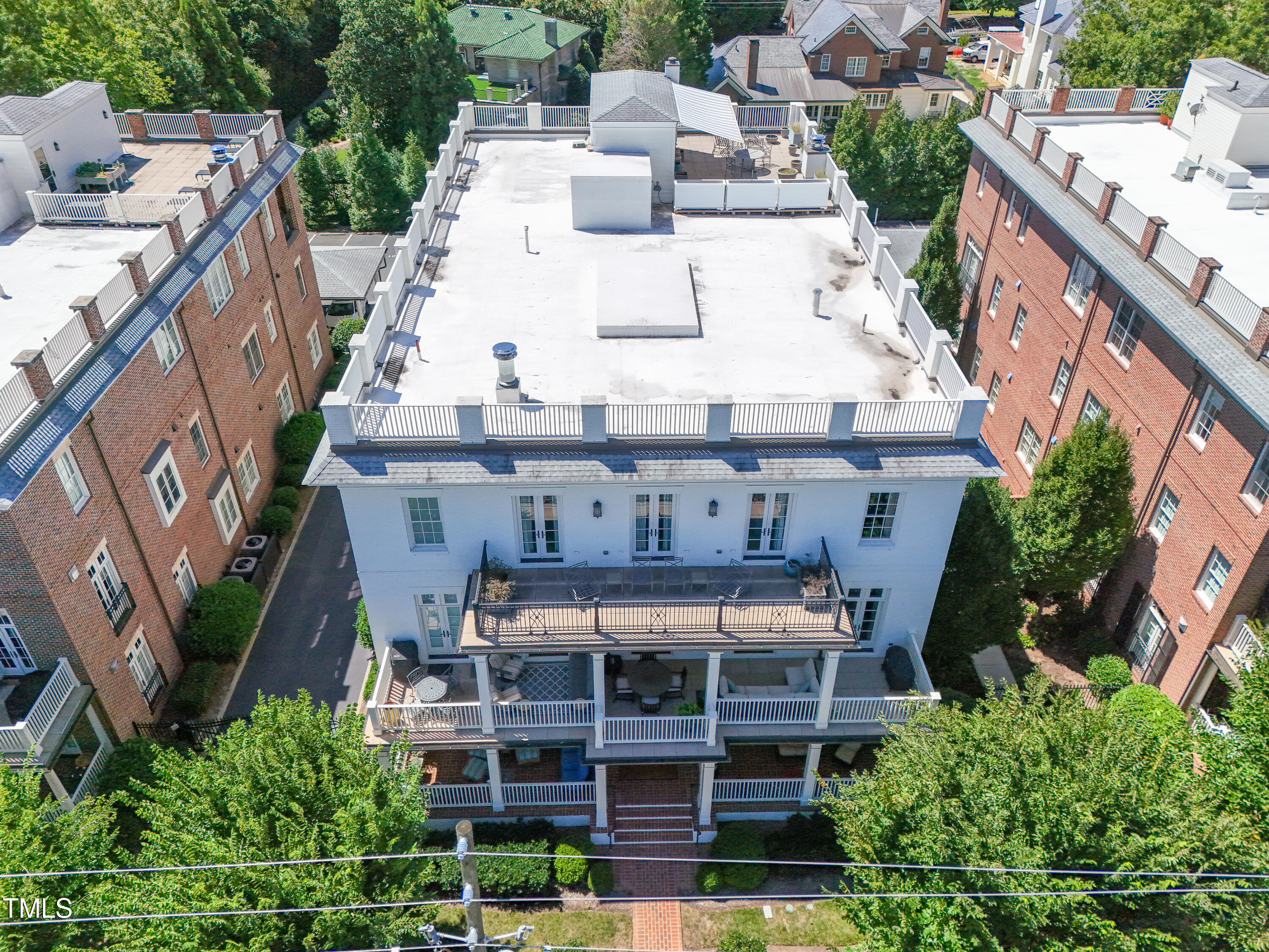 2015 Fairview Road, Unit 200 Raleigh, NC 27608 - Photo 39 of 58 a view of a building with windows and plants