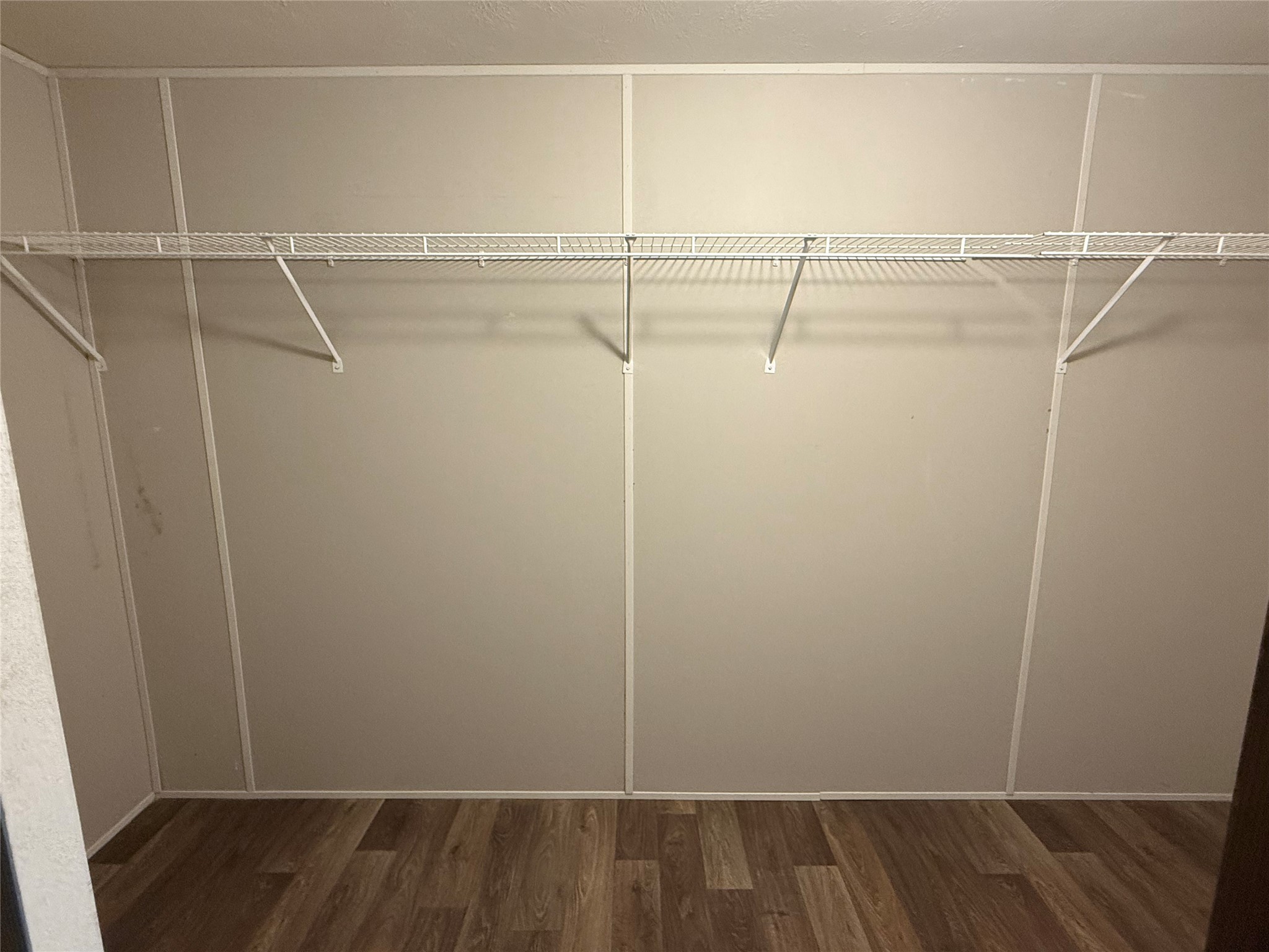 4788 Wickwillow Lane Alvin, TX 77511 - Photo 3 of 6 a view of an empty walk in closet