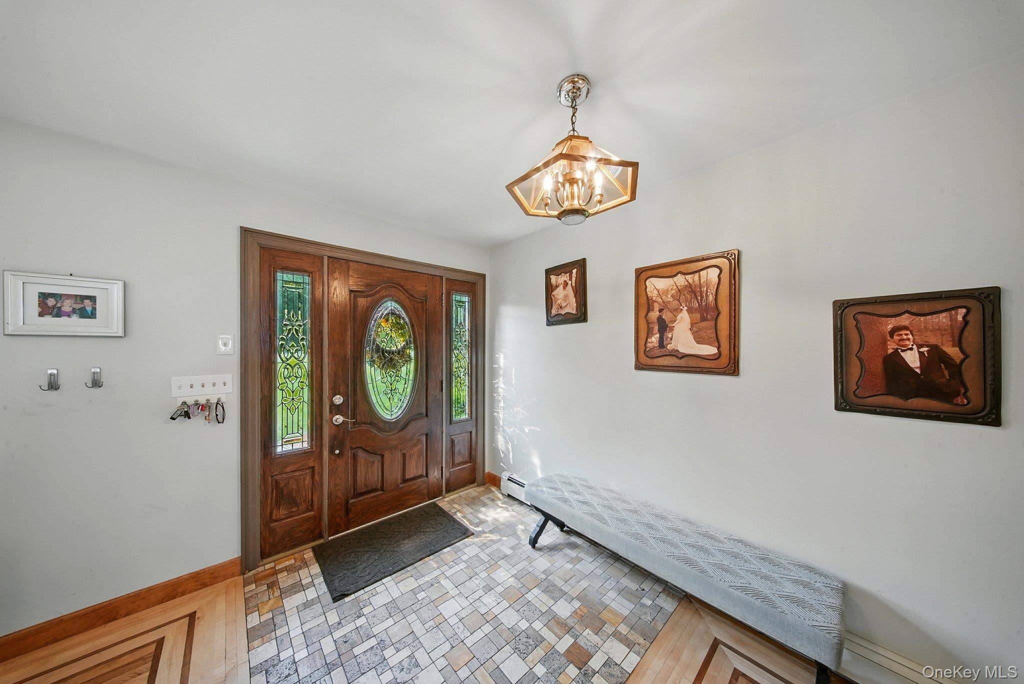 193 Dill Road Forestburgh, NY 12777 - Photo 5 of 31 Entryway with a chandelier