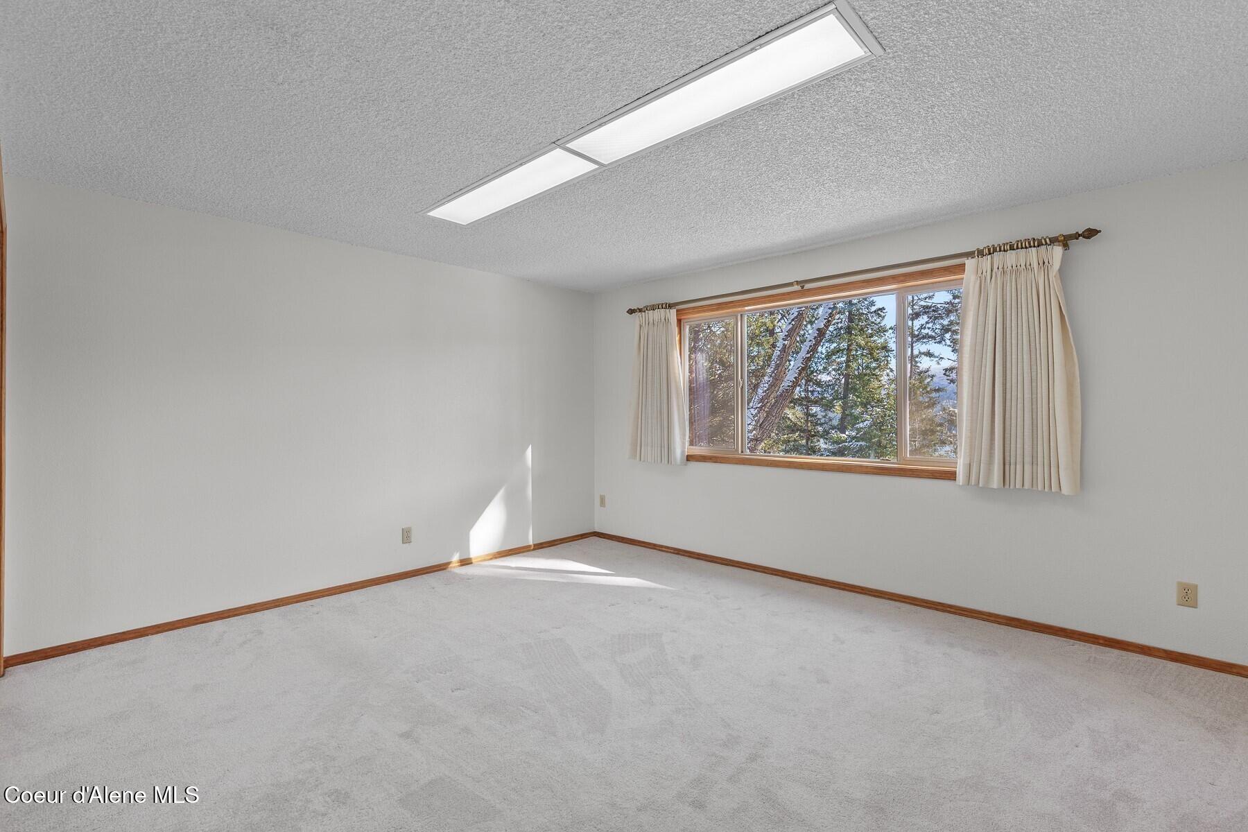 5977 East McMahon Road Hayden, ID 83835 - Photo 16 of 39 Primary BR main level