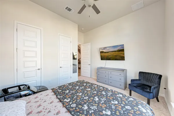 a bathroom with a shower and a glass door