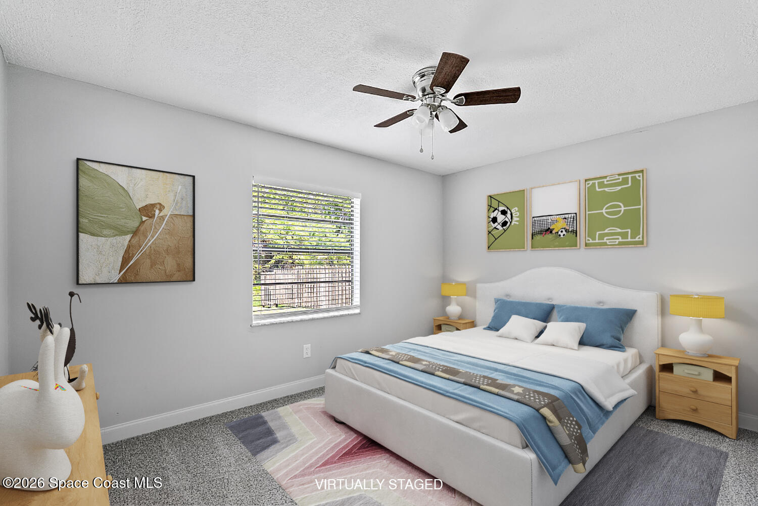 914 Devon Avenue Sebastian, FL 32958 - Photo 27 of 40 a bedroom with a bed and a chandelier
