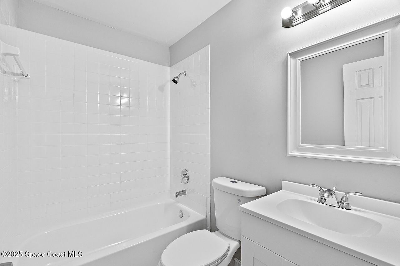 914 Devon Avenue Sebastian, FL 32958 - Photo 31 of 40 a bathroom with a sink toilet and shower