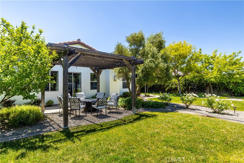669 Red Cloud Road Paso Robles, CA 93446 - Photo 46 of 61 a view of a swimming pool and lounge chairs