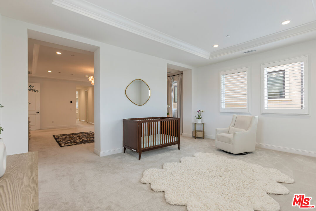11734 Manchester Way Porter Ranch, CA 91326 - Photo 15 of 35 a living room with furniture and a window