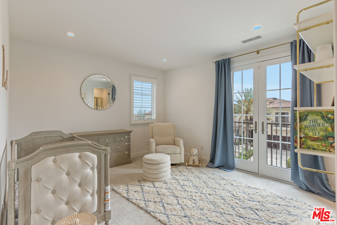 11734 Manchester Way Porter Ranch, CA 91326 - Photo 19 of 35 a spacious bathroom with a toilet sink and shower