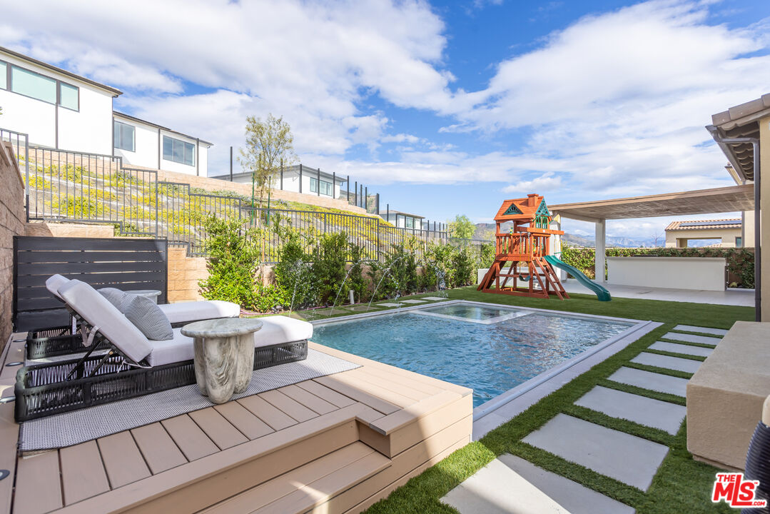 11734 Manchester Way Porter Ranch, CA 91326 - Photo 28 of 35 a view of a terrace with furniture