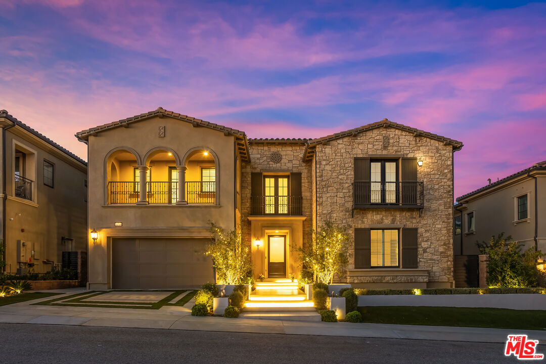 11734 Manchester Way Porter Ranch, CA 91326 - Photo 31 of 35 a front view of a house