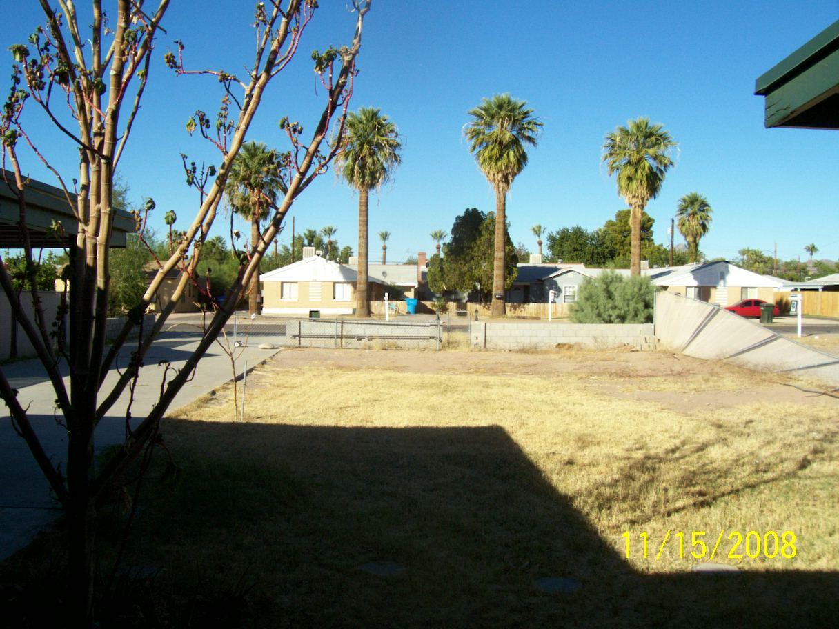1711 East Cheery Lynn Road Phoenix, AZ 85016 - Photo 6 of 6 a view of swimming pool with a table and chairs