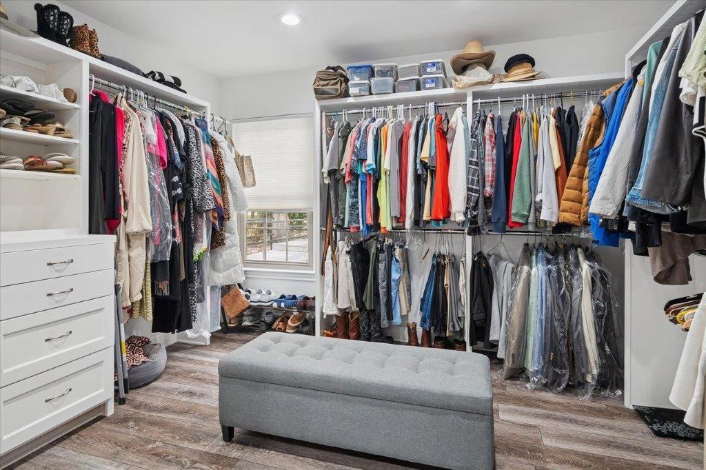 154 Bayside Circle Malakoff, TX 75148 - Photo 19 of 40 a view of walk in closet with clothes and shoes