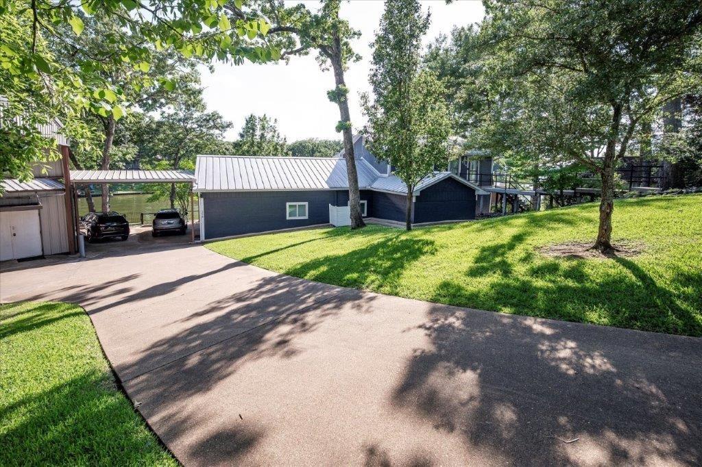 154 Bayside Circle Malakoff, TX 75148 - Photo 37 of 40 a view of a backyard with a garden