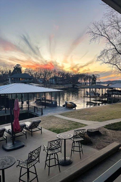 154 Bayside Circle Malakoff, TX 75148 - Photo 40 of 40 a view of a patio with table and chairs with wooden floor and fence