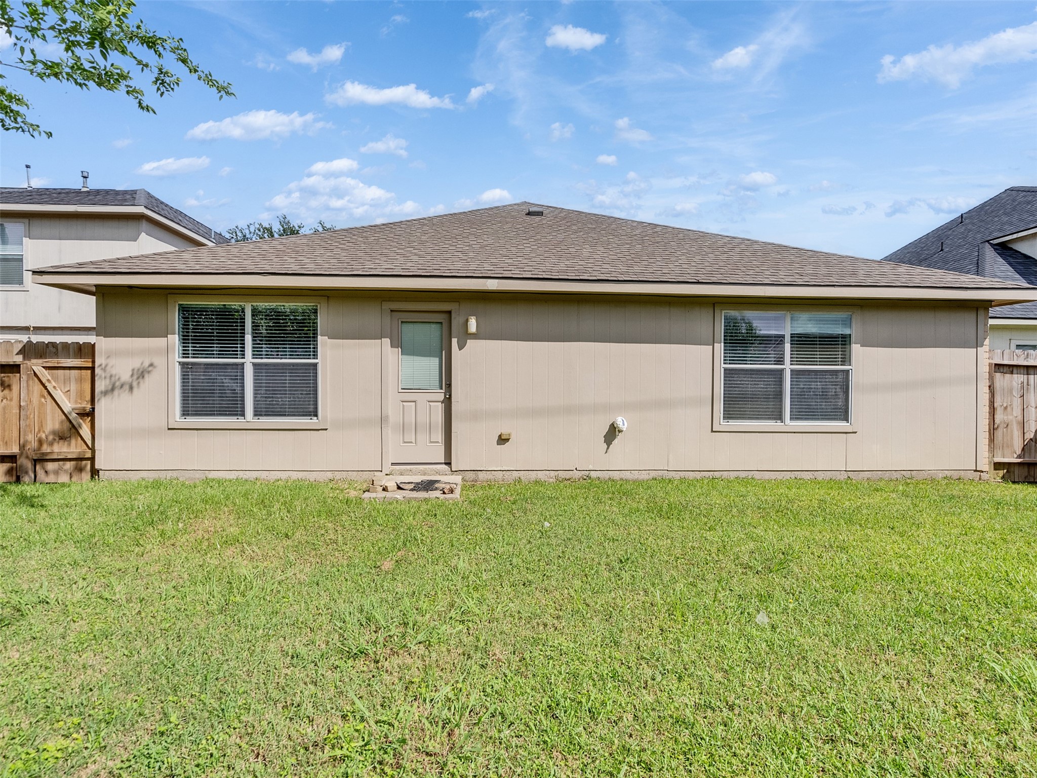 13431 Rural Oak Street Houston, TX 77034 - Photo 21 of 24 front view of a house with a yard