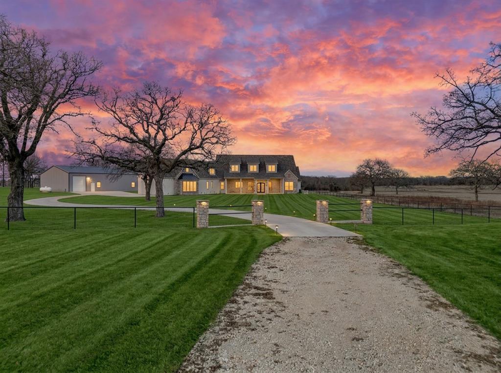623 Lake Valley Road Sunset, TX 76270 - Photo 2 of 40 front view of a house with a big yard