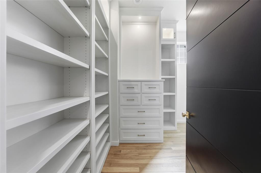 623 Lake Valley Road Sunset, TX 76270 - Photo 22 of 40 a view of walk in closet with empty racks