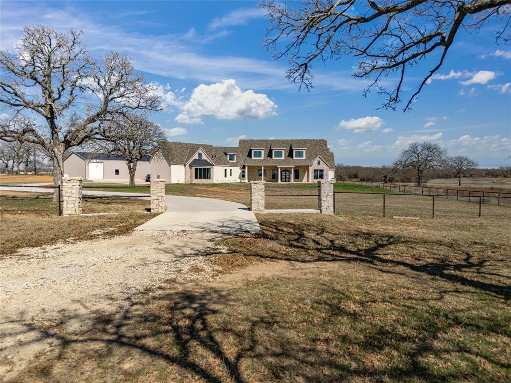 623 Lake Valley Road Sunset, TX 76270 - Photo 40 of 40 a view of a yard with wooden fence