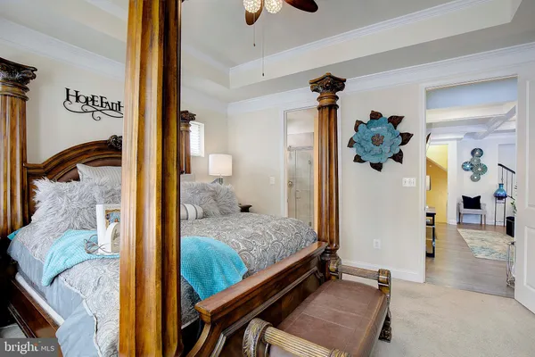 a bathroom with a shower and a glass door