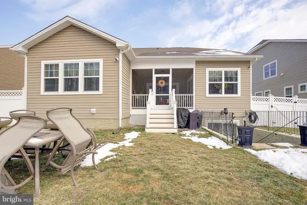 a view of a house with snow on the ground