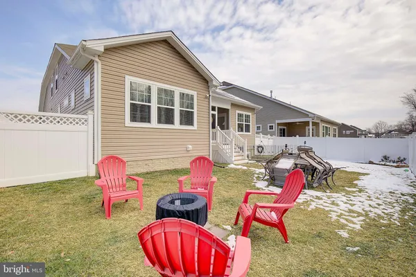 a view of a backyard of the house