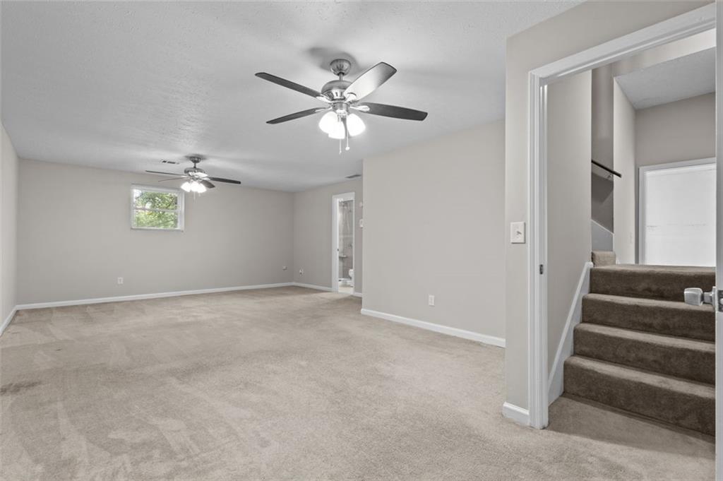 8990 Tweeddale Drive Winston, GA 30187 - Photo 22 of 26 a view of an empty room with a window