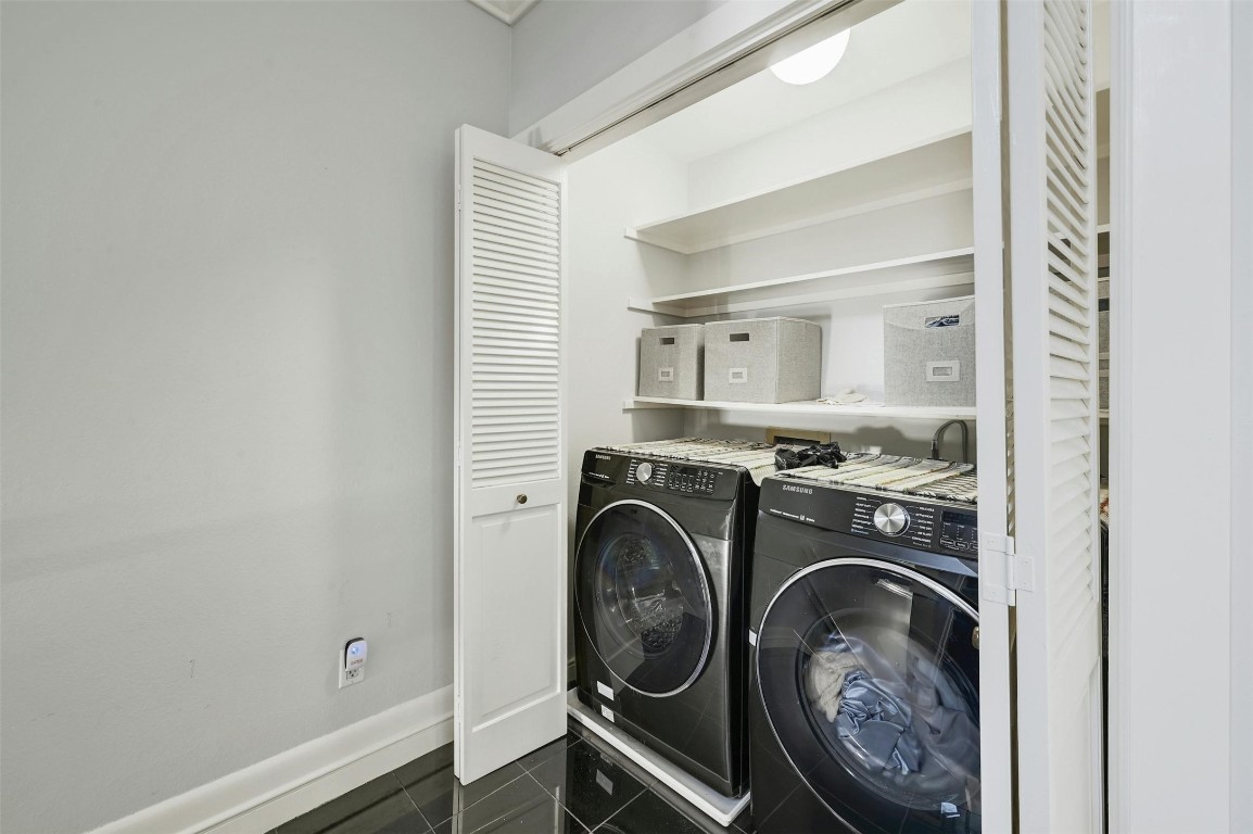 1937 Rue De St Tropez, Unit 9 Austin, TX 78746 - Photo 22 of 33 a utility room with sink dryer and washer