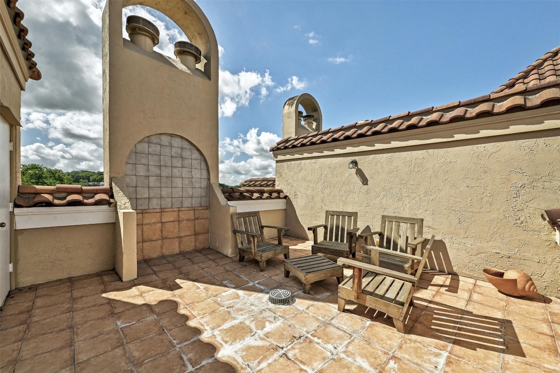 1937 Rue De St Tropez, Unit 9 Austin, TX 78746 - Photo 28 of 33 a outdoor space with sitting area