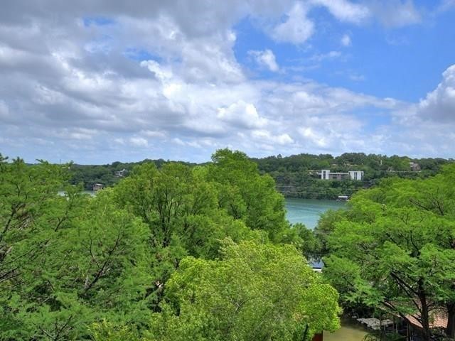 1937 Rue De St Tropez, Unit 9 Austin, TX 78746 - Photo 32 of 33 a view of a lake