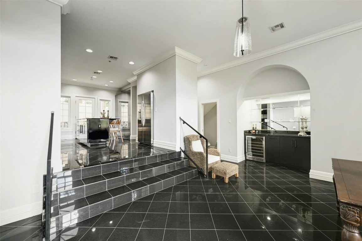 1937 Rue De St Tropez, Unit 9 Austin, TX 78746 - Photo 10 of 33 a lobby with furniture and a rug