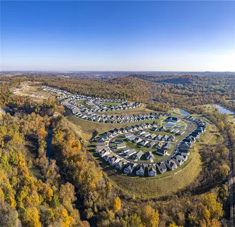 an aerial view of a swimming pool patio and mountain view