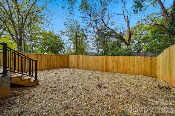 a view of a wooden fence