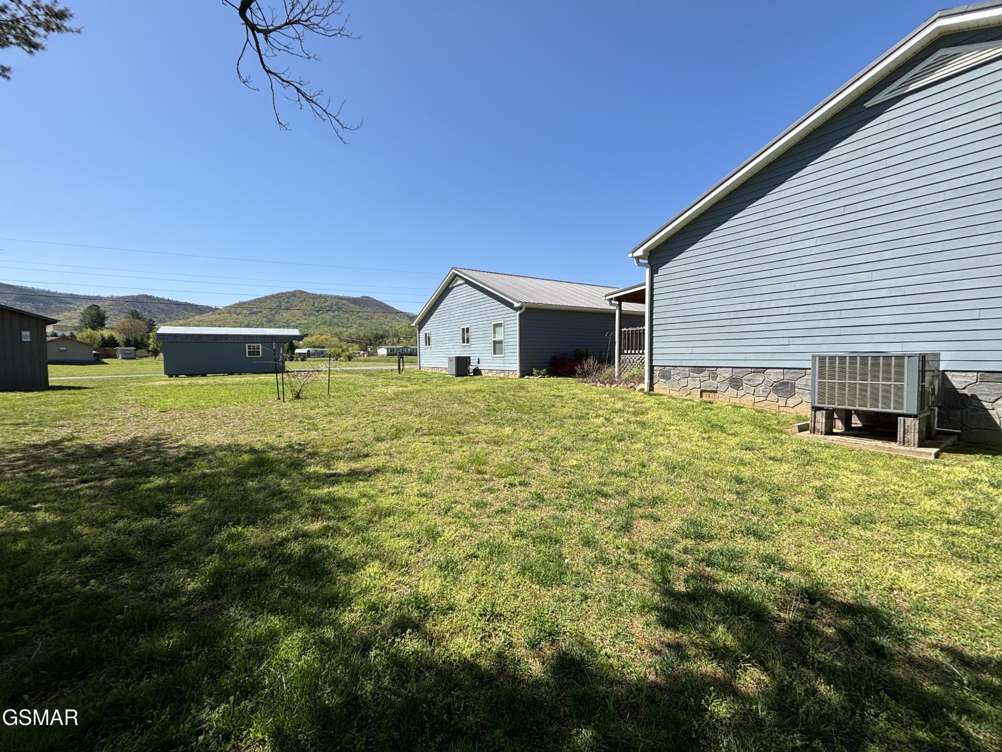 147 Padgett Mill Road Cosby, TN 37722 - Photo 15 of 36 a view of a house with a yard