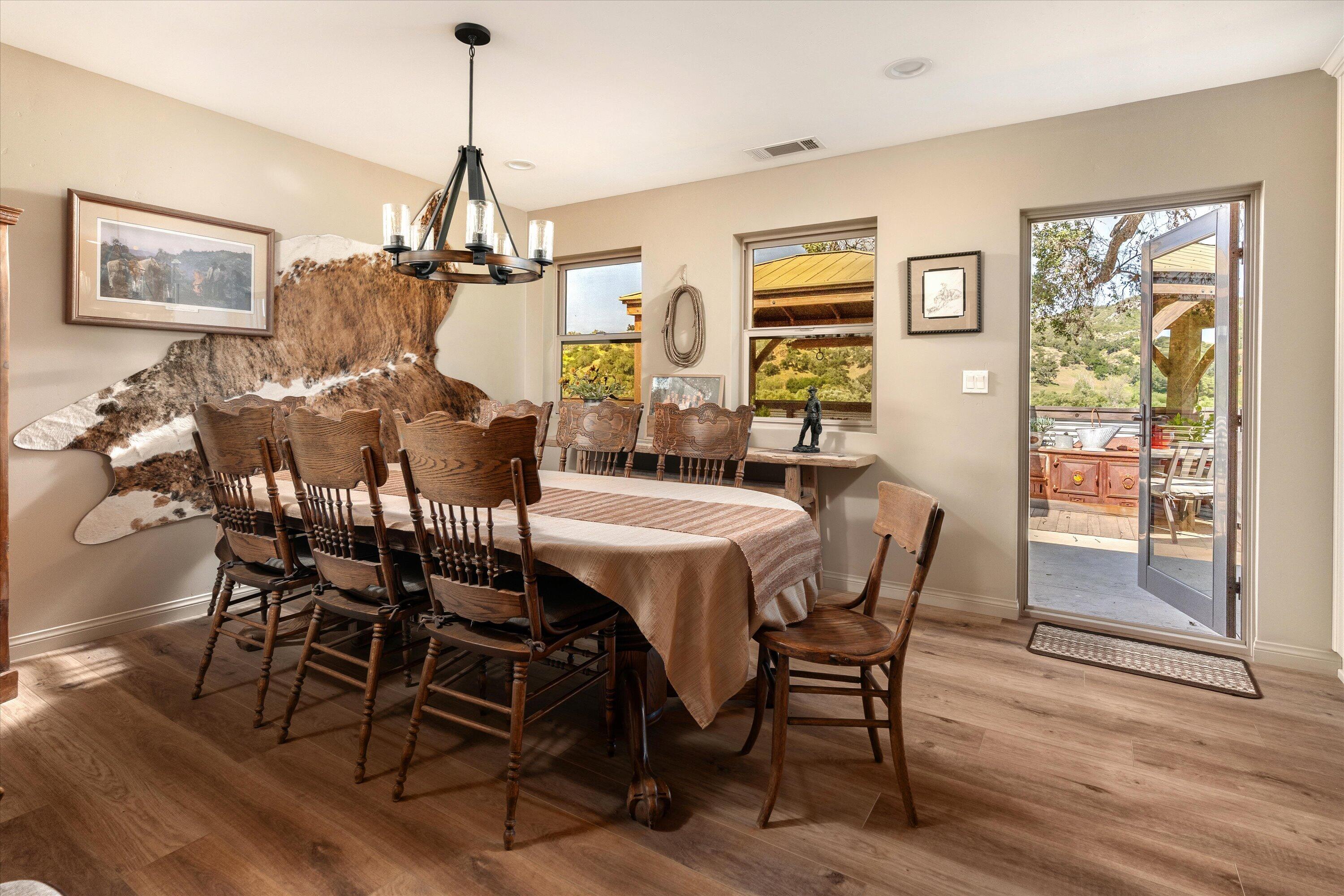 12707 Huasna Road Arroyo Grande, CA 93420 - Photo 36 of 77 a view of a dining room with furniture window and wooden floor