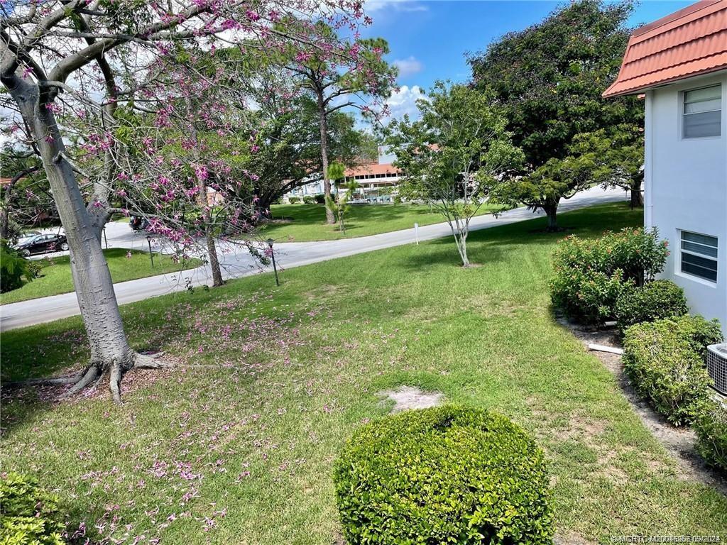2600 Southeast Ocean Boulevard, Unit H9 Stuart, FL 34996 - Photo 9 of 21 a view of a park with large trees