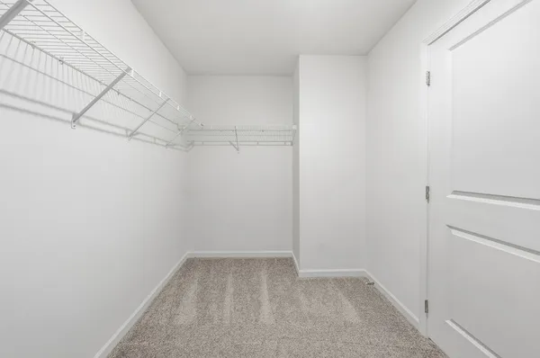 a view of a room with racks on the wall