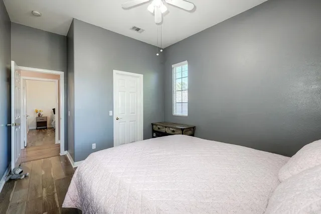 a view of a livingroom with furniture and a workspace